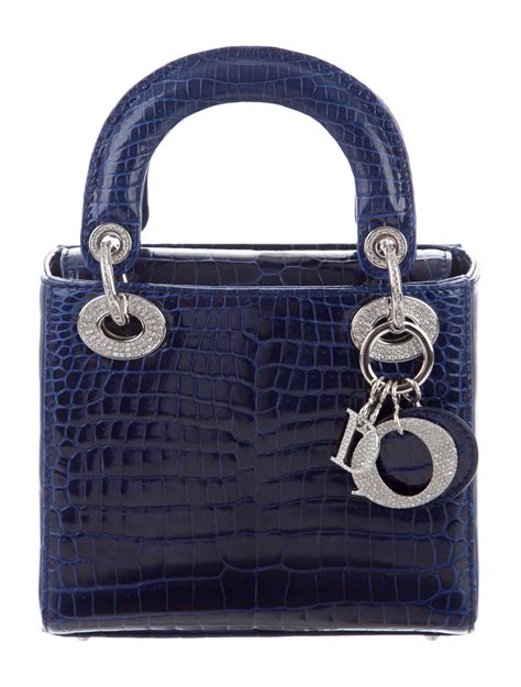 small blue dior bag